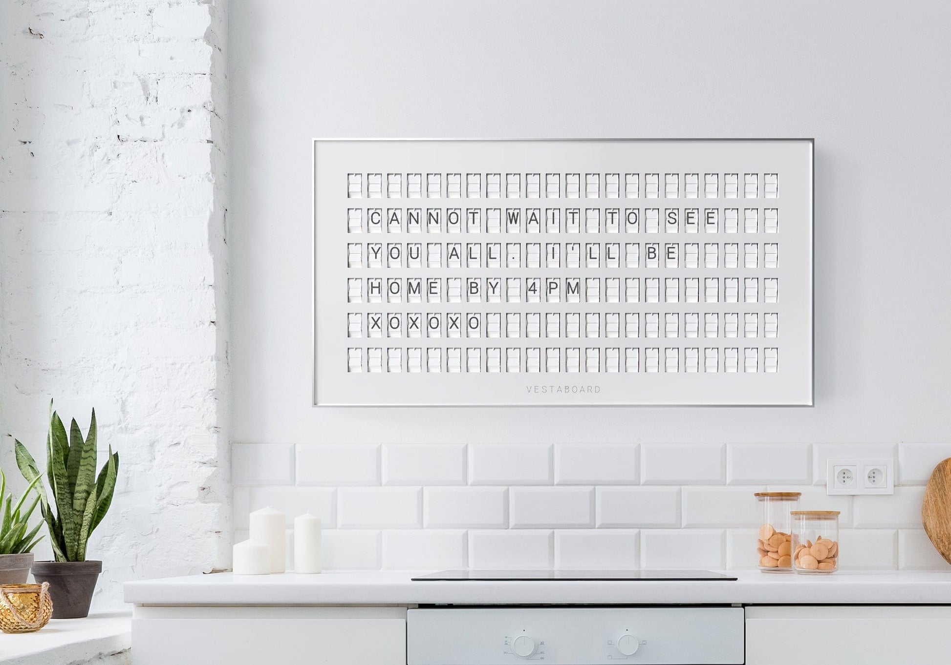 Stylish Vestaboard powered via WiFi, installed in a creative workspace.