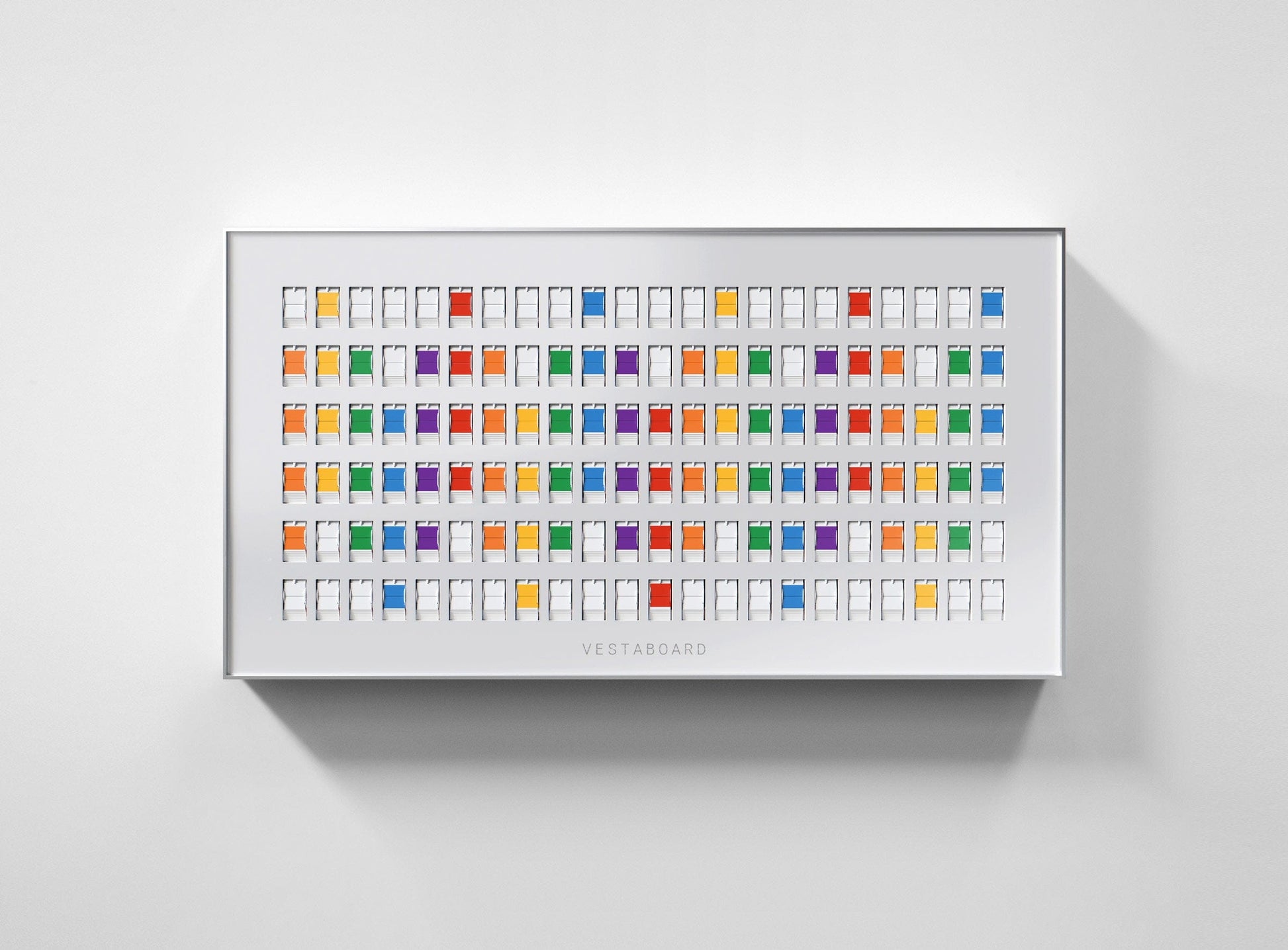 Vestaboard in a café, displaying a welcome note for customers.