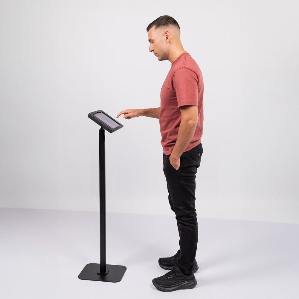 Person using VESA Swift Floor Stand 