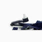 Forstag Ink Tag hanging safely on a bra strap with quick-release mechanism