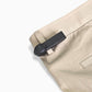 Mitag MiTag Clip Tag attached to a jeans belt loop, securing apparel without damaging fabric