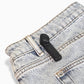 MiTag Pencil with Pin on jeans, secure anti-theft tag for apparel and denim protection.