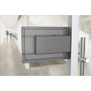 Close-up of Side Mount’s hidden pocket concealing PoE power and networking adapters for clean, professional displays.
