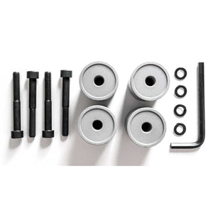 Microsoft Surface Hub Wall Mount Adapter Kit components laid out, showing universal spacer pieces.