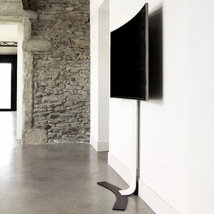 Acadia No-Drill TV Wall Mount holding 55" TV, securely installed without drilling.